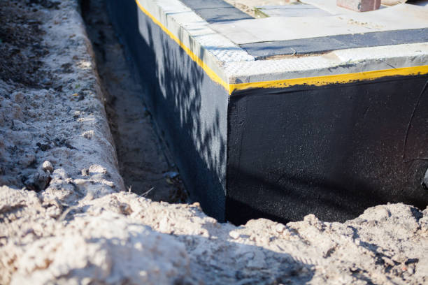 Professional Exterior Waterproofing technician working in Riverside, IL